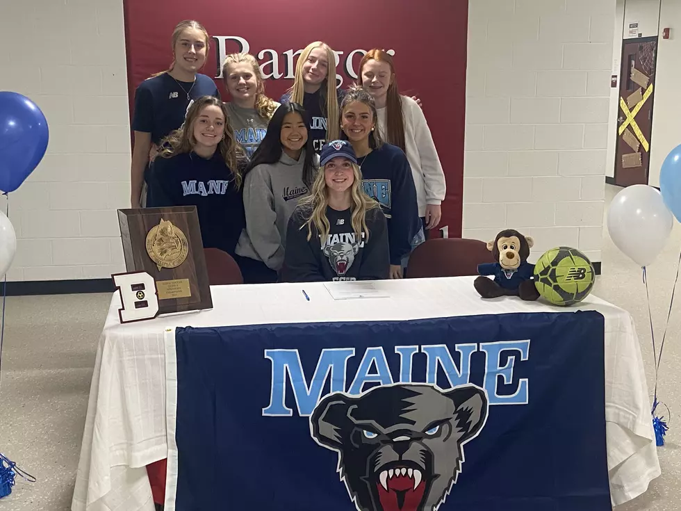 Olivia Scott NLI Signing with Teammates and Friends Photo Chris Popper